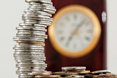 Des pièces de monnaie qui représentent des frais liés à une hypothèque