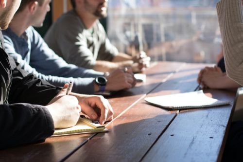 Certified appraisers at a table