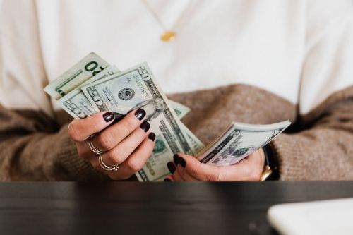 Woman calculating money