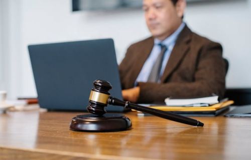 Notary with a judge's gavel on his desk
