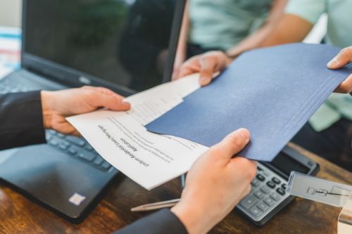 Loaner hanging out a deed of trust to a client