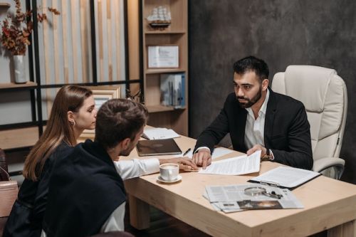 A notary advises a young couple
