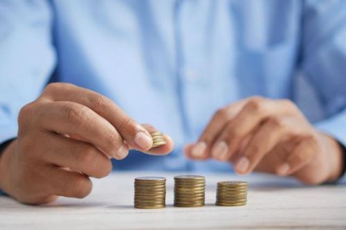 A real estate broker counting money