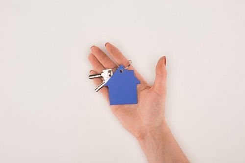 Hand with key